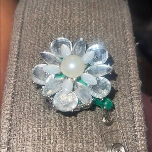 Elegant Silver and White Floral Brooch